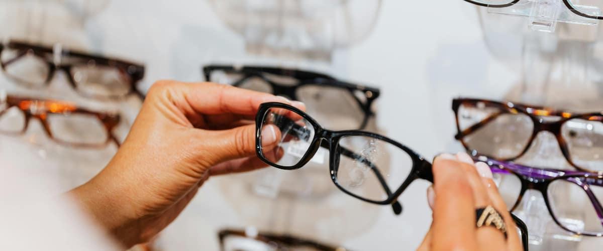 shelf of glasses in an opticians